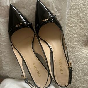 Prada patent leather slingback pumps with kitten heel